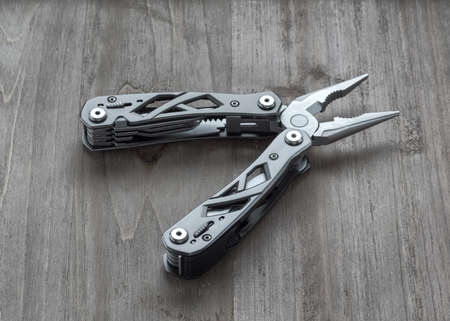 stanless steel multitool isolatedの写真素材