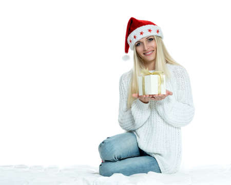 Beautiful Happy Girl with Christmas Gift.の写真素材