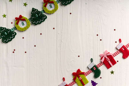 Christmas decoration on a background of white painted rustic boards with copyspaceの写真素材