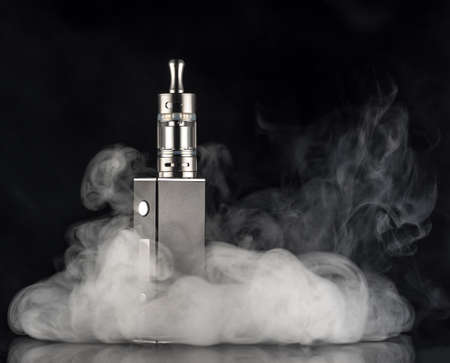 electronic cigarette over a dark backgroundの写真素材