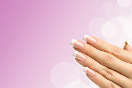 Woman hands with french manicure  close upの写真素材