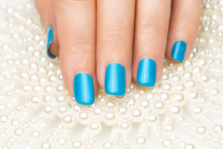 Beautiful woman's nails with nice stylish manicureの写真素材
