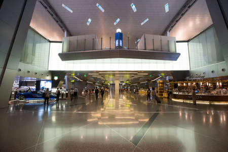 DOHA, QATAR - JUNE 9, 2016: Interior of Hamad International Airport in Doha, Qatar. Base airport are airlines: Qatar Airways.のeditorial素材