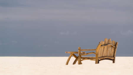 Sitting place and table in a tropical beachの写真素材