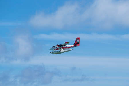 Indian Ocean, Malddives - June 22, 2017: A Maldivian Air Taxi water plain is waiting to accept passengers.のeditorial素材