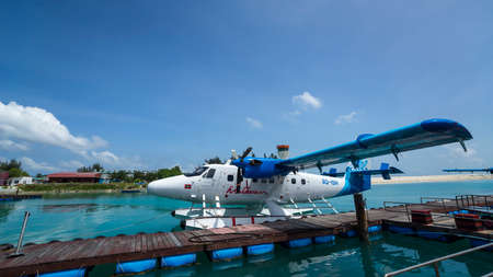 Male, Maldives  - June 15, 2017 : Seaplane air taxi fly over Atolls in Indian Ocean To transfer...