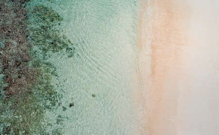 Beautiful tropical white empty beach and sea waves seen from above. Seychelles beach aerial viewの写真素材