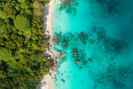 Spectacular aerial view of coastline and turquoise sea, Seychelles in the Indian Ocean.Top view from...