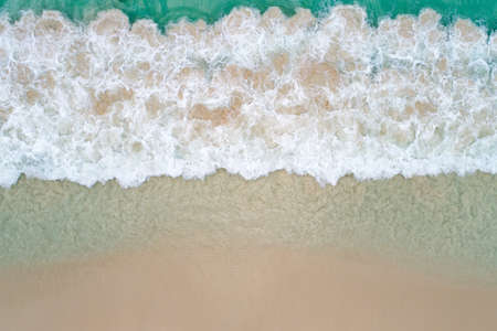 Aerial top view beautiful sea landscape, beach and wave with turquoise sea water with copy space