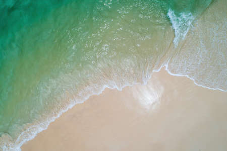 Aerial top view beautiful sea landscape, beach and wave with turquoise sea water with copy space
