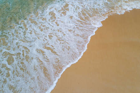 Aerial top view beautiful sea landscape, beach and wave with turquoise sea water with copy space
