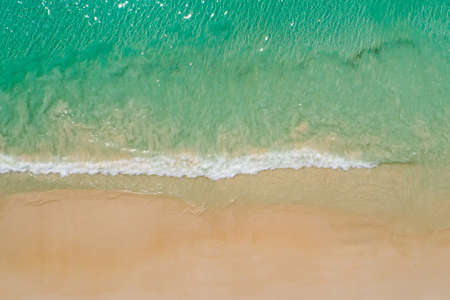 Aerial top view beautiful sea landscape, beach and wave with turquoise sea water with copy space