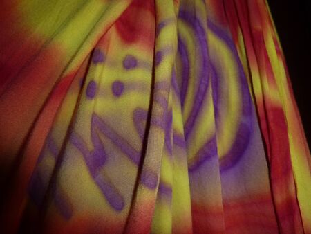 closeup of a piece of bright colored fabricの写真素材