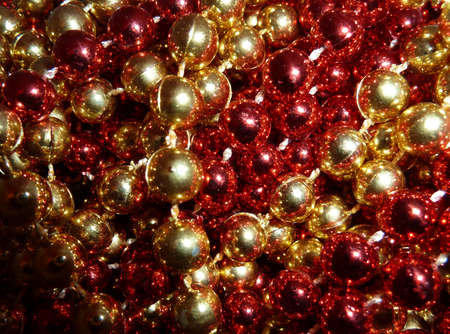 shiny red and gold beadsの写真素材