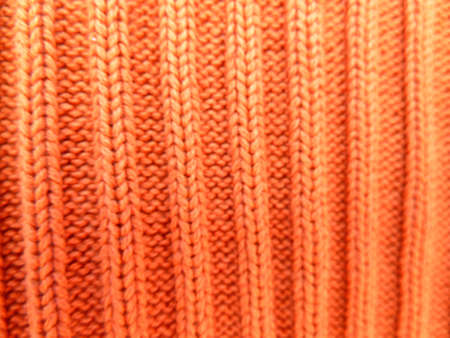 orange ribbed fabric as a backgroundの写真素材
