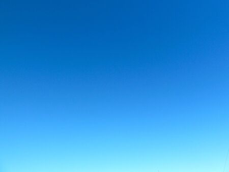 perfect bright blue sky as a backgroundの写真素材