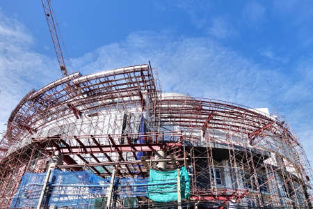 Construction site with crane and building