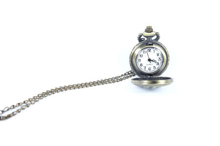 Antique pocket watch with open lid. Isolated on white background.の写真素材