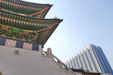 Gyeongbokgung Palace with the building in the background.のeditorial素材
