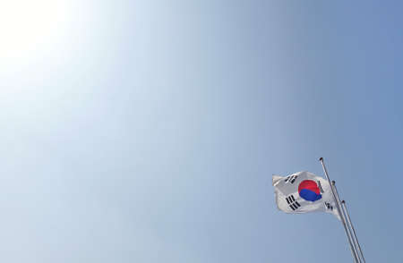 SOUTH KOREA flag floating in the windの写真素材