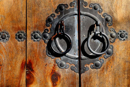 Traditional Korean style door at Bukchon Hanok Village in Seoul, South Korea.の写真素材