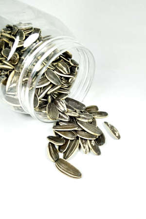 sunflower seeds on white backgroundの写真素材