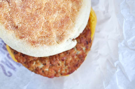 english Muffin for breakfast with  Cheese and Sausageの写真素材