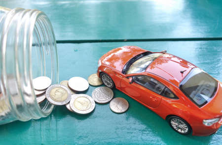 car and money coins. car Loan concept.