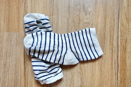 worn out old socks with hole.の写真素材