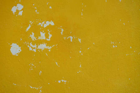 Abstract colorful cement wall texture , yellow paint.の写真素材