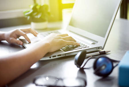 Fingers typing on keyboard,Working at home with laptop