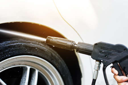 Car wash foam water or cleaning  at home,Using High Pressure Waterの写真素材