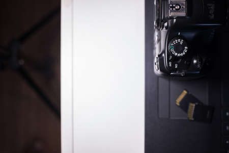 Digital camera with  memory card on laptop preparing to transfer photosの写真素材