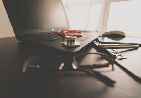Stethoscope red color on table,Healthcare and medical concept,Selective focusの写真素材