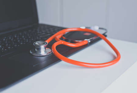 Stethoscope red on table,Healthcare and medical concept,Selective focusの写真素材