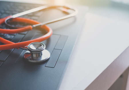 Stethoscope red on table,Healthcare and medical concept,Selective focusの写真素材
