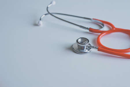 Stethoscope red on table,Healthcare and medical concept,Selective focusの写真素材