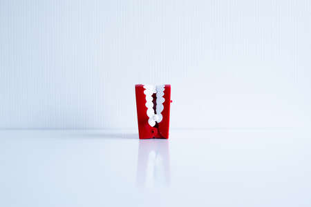 Dentist diagnose plastic teeth models on white blackground,Concept of dental checking