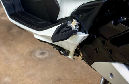 Motorcycle modern steel footrest or pedal,close up