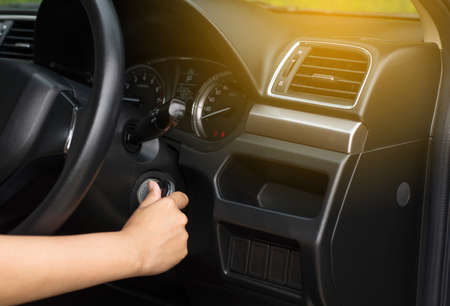 Hand woman driver holding car keys with starup the machine or engine