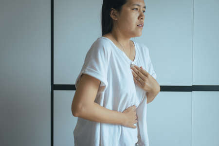 Woman having or symptomatic reflux acids,Gastroesophageal reflux disease,Because the esophageal...