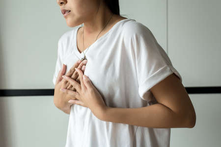 Woman having or symptomatic reflux acids,Gastroesophageal reflux diseaseの写真素材