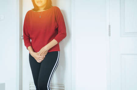 Hands woman holding her crotch,Female need to pee
