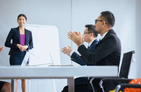 Group of business people hands clapping after meeting,Success presentation and coaching seminar at officeの写真素材