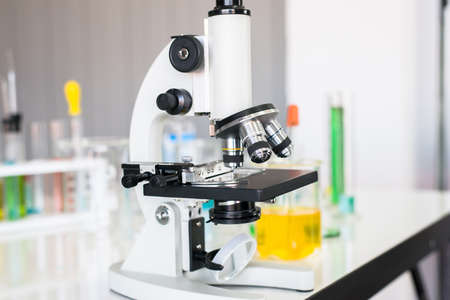 Picture of microscope with metal lens for research and medical equipmentin laboratory