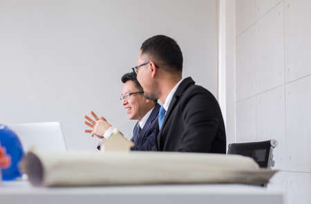 Asian business people in room meeting,Team group discussing together in conference at officeの写真素材