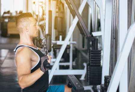 Sport man doing exercises training,Cross fit body and muscular in the gym