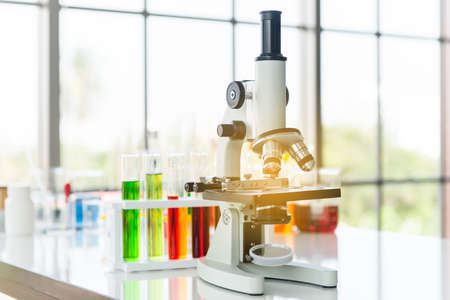 Picture of microscope with metal lens for research and medical equipmentin laboratory