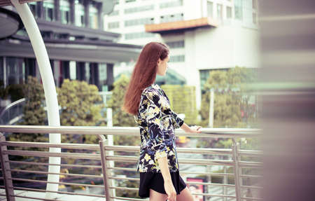 Portrait beautiful woman walking in the city,Female confidence looking for something,Lifestyle...