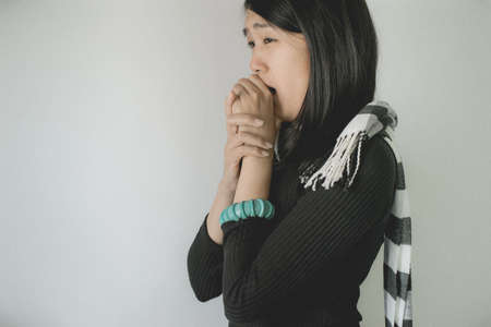 Asian female suffering with cough a lot in bedroom,Woman coughing with sore throat